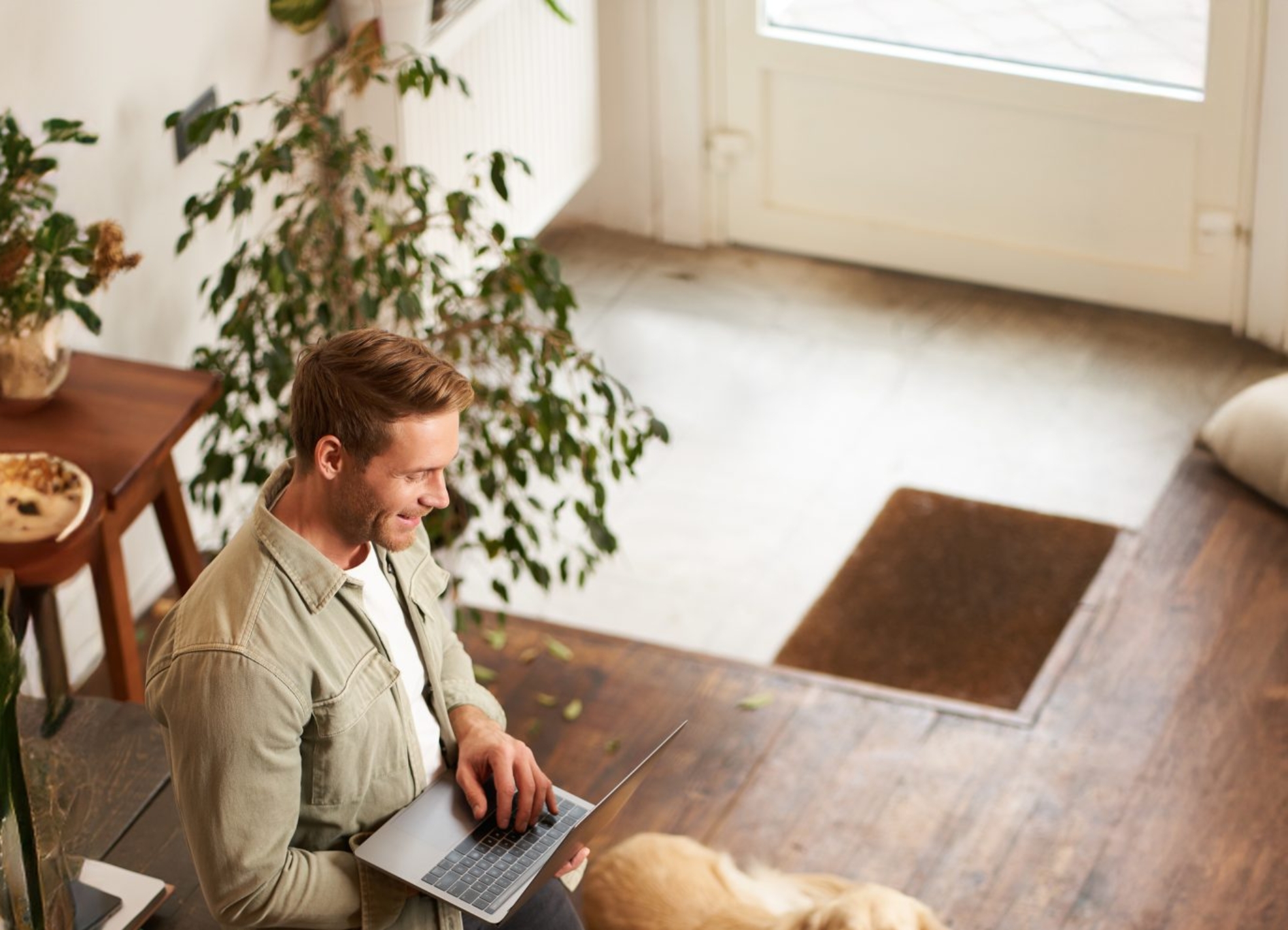 vertical-shot-handsome-businessman-young-office-with-pet-scaled-1